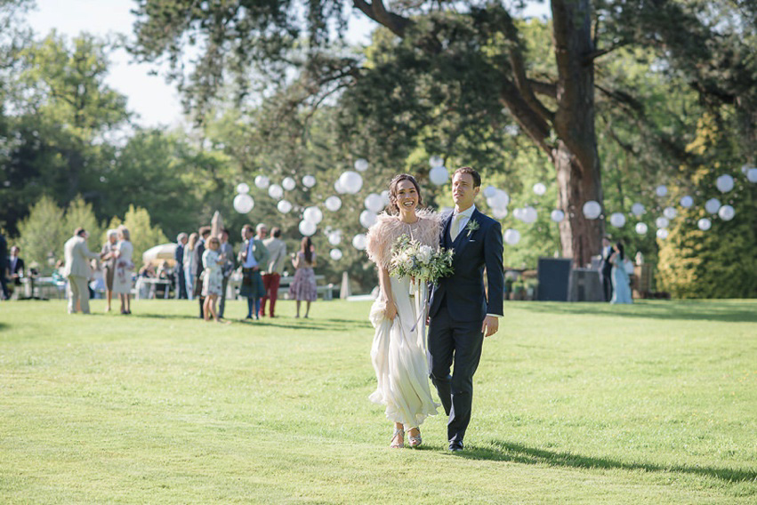 A Theia Couture wedding dress and ostrich feathers for this elegant Babington House wedding. Photography by Ria Mishaal.