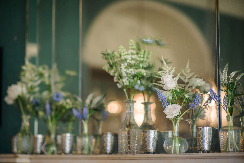 A Theia Couture wedding dress and ostrich feathers for this elegant Babington House wedding. Photography by Ria Mishaal.