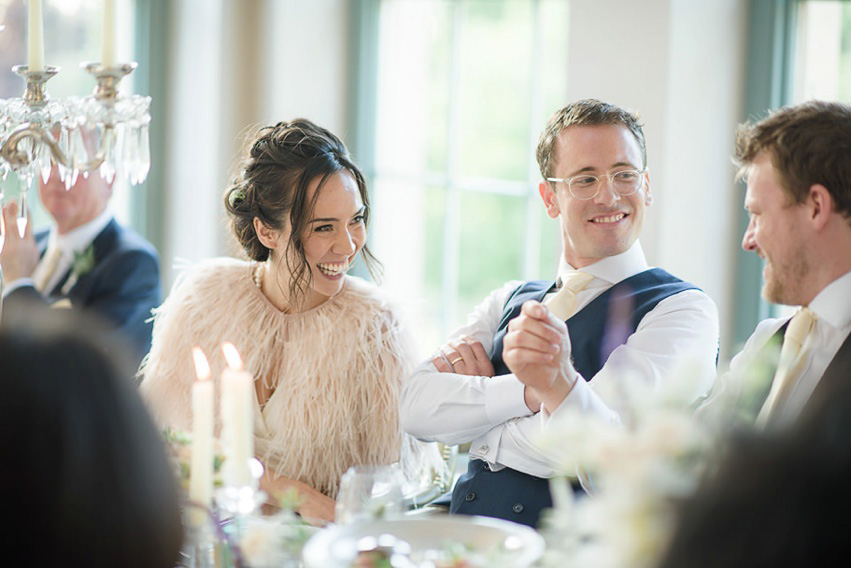 A Theia Couture wedding dress and ostrich feathers for this elegant Babington House wedding. Photography by Ria Mishaal.