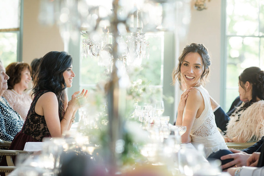 A Theia Couture wedding dress and ostrich feathers for this elegant Babington House wedding. Photography by Ria Mishaal.