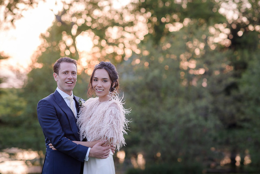 A Theia Couture wedding dress and ostrich feathers for this elegant Babington House wedding. Photography by Ria Mishaal.