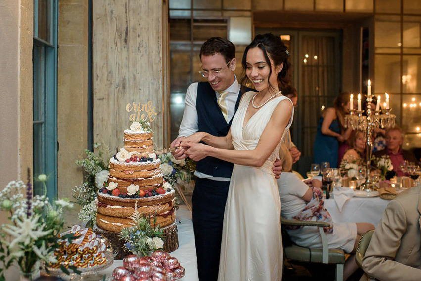 A Theia Couture wedding dress and ostrich feathers for this elegant Babington House wedding. Photography by Ria Mishaal.