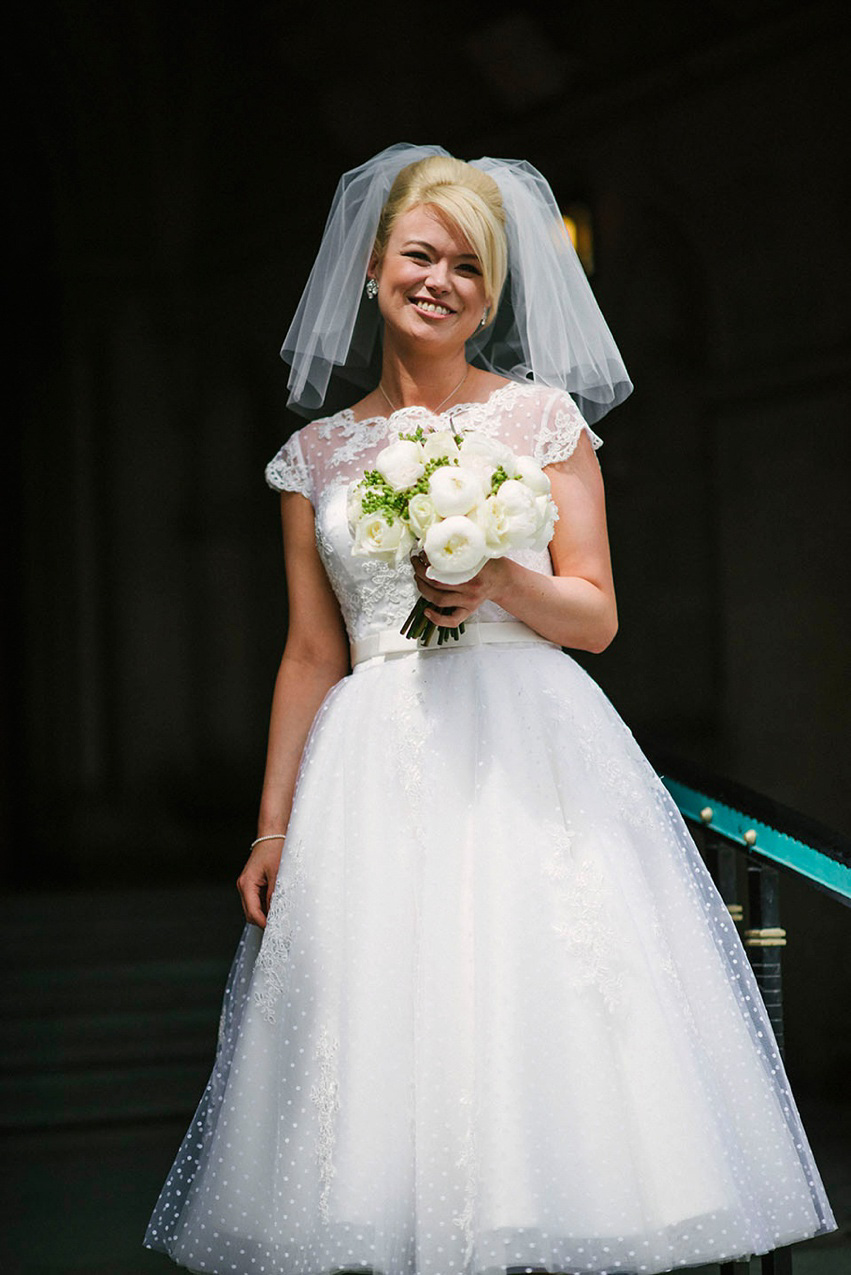 The bride wears a 1950's inspired polka dot dress by Mooshki Bride.  Photography by Kerry Woods.