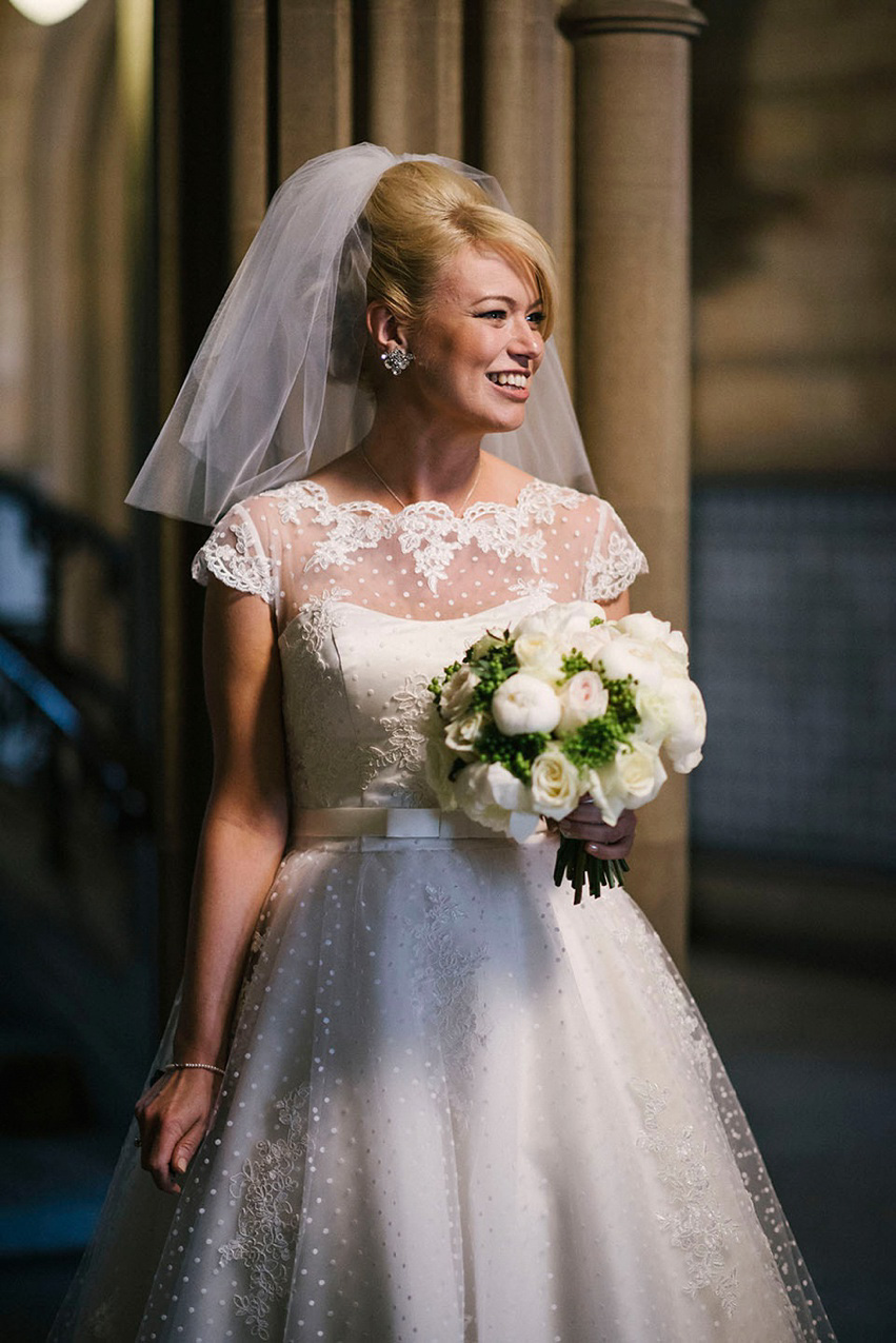 The bride wears a 1950's inspired polka dot dress by Mooshki Bride.  Photography by Kerry Woods.