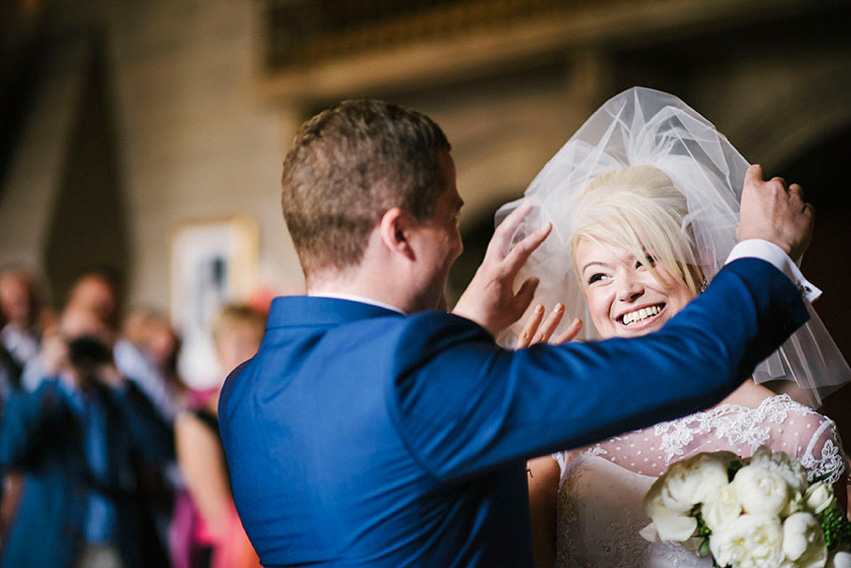 The bride wears a 1950's inspired polka dot dress by Mooshki Bride.  Photography by Kerry Woods.