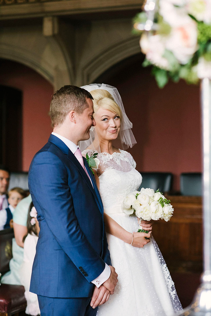 The bride wears a 1950's inspired polka dot dress by Mooshki Bride.  Photography by Kerry Woods.