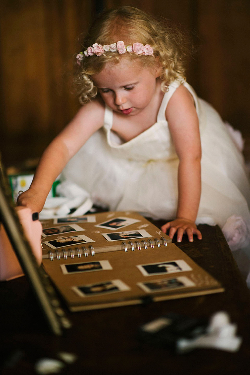 The bride wears a 1950's inspired polka dot dress by Mooshki Bride.  Photography by Kerry Woods.