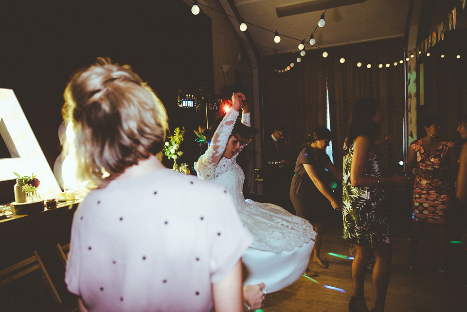 The bride wears a 1950's inspired lace dress for her village hall wedding in Yorkshire. Photography by Shutter Go Click.