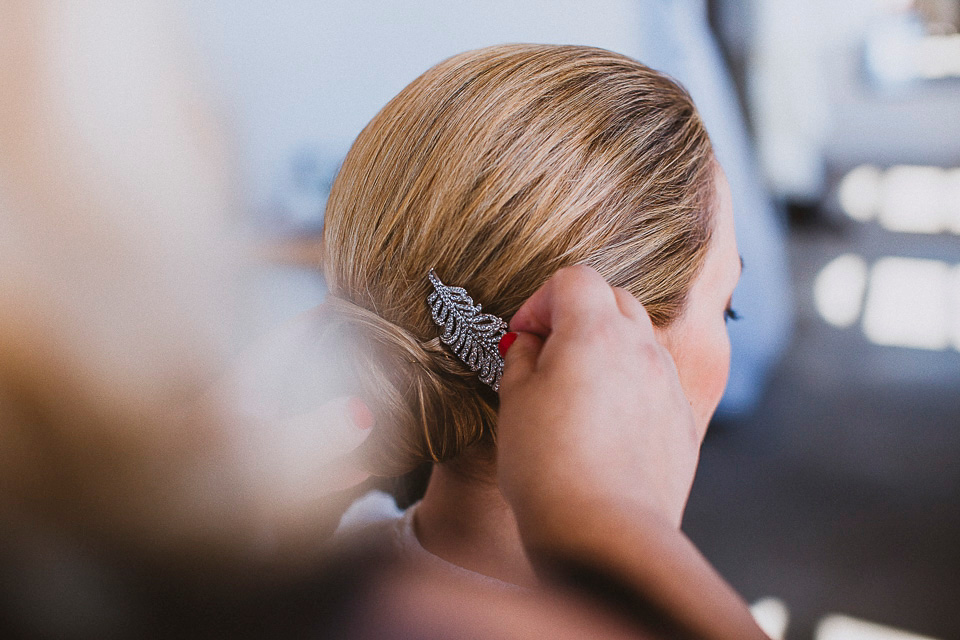 The bride wears Mori Lee for her glamorous rooftop New York wedding. Photography by Forged In The North