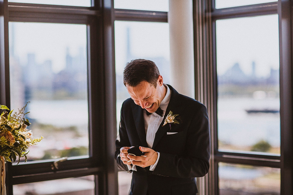 The bride wears Mori Lee for her glamorous rooftop New York wedding. Photography by Forged In The North