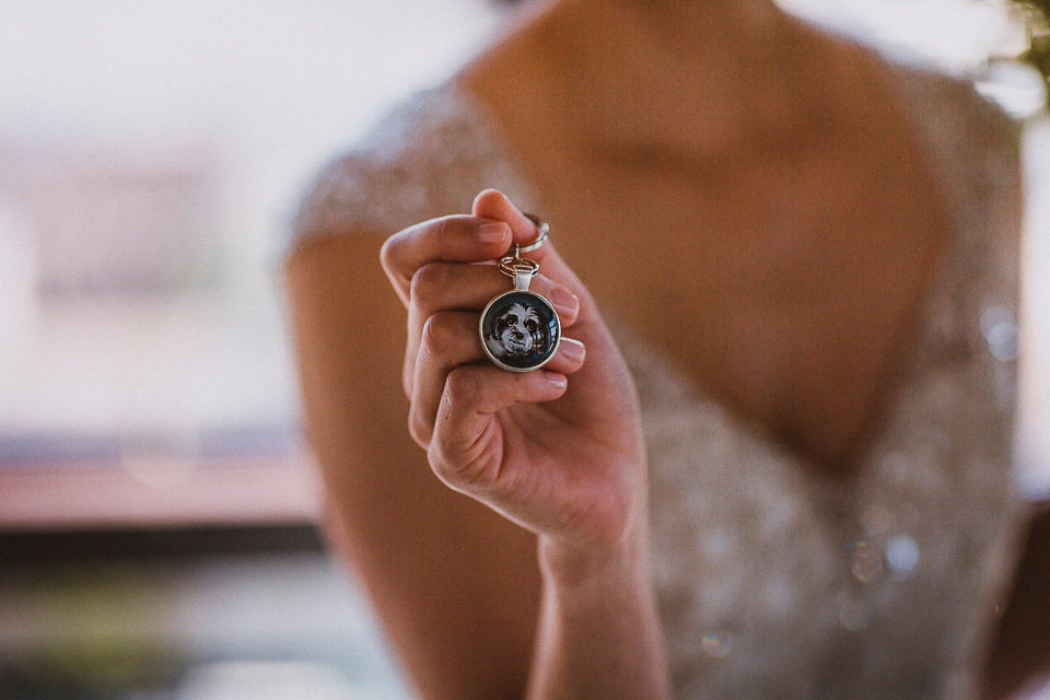 The bride wears Mori Lee for her glamorous rooftop New York wedding. Photography by Forged In The North