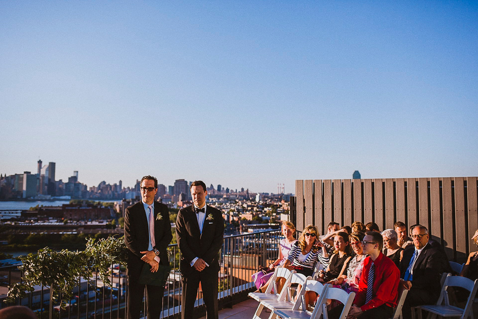 The bride wears Mori Lee for her glamorous rooftop New York wedding. Photography by Forged In The North