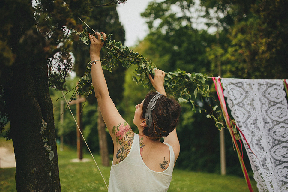 The bride wears Grace Loves Lace for her laid back, rustic, simple and elegant outdoor wedding in the Italian hillsides. Photography by Peter Jurica, film by Happy Wedding Films.