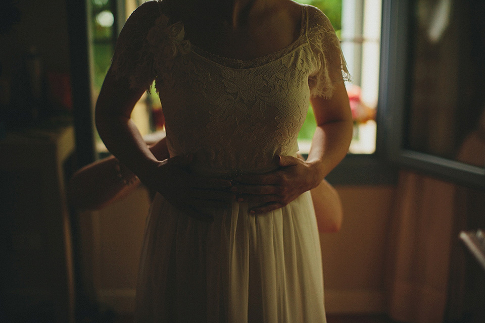 The bride wears Grace Loves Lace for her laid back, rustic, simple and elegant outdoor wedding in the Italian hillsides. Photography by Peter Jurica, film by Happy Wedding Films.