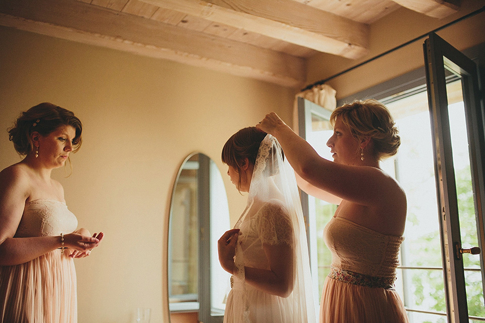 The bride wears Grace Loves Lace for her laid back, rustic, simple and elegant outdoor wedding in the Italian hillsides. Photography by Peter Jurica, film by Happy Wedding Films.