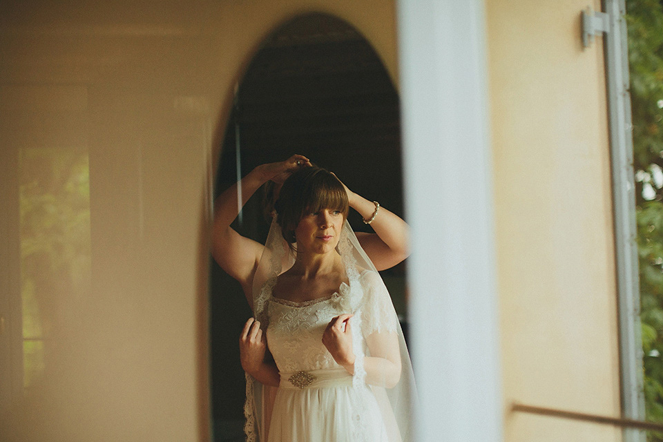 The bride wears Grace Loves Lace for her laid back, rustic, simple and elegant outdoor wedding in the Italian hillsides. Photography by Peter Jurica, film by Happy Wedding Films.