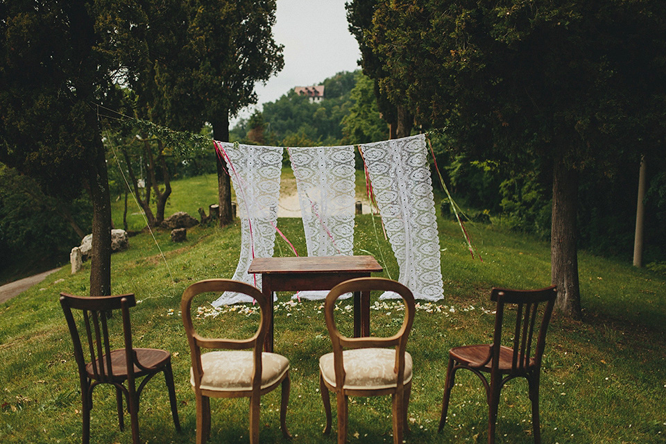 The bride wears Grace Loves Lace for her laid back, rustic, simple and elegant outdoor wedding in the Italian hillsides. Photography by Peter Jurica, film by Happy Wedding Films.