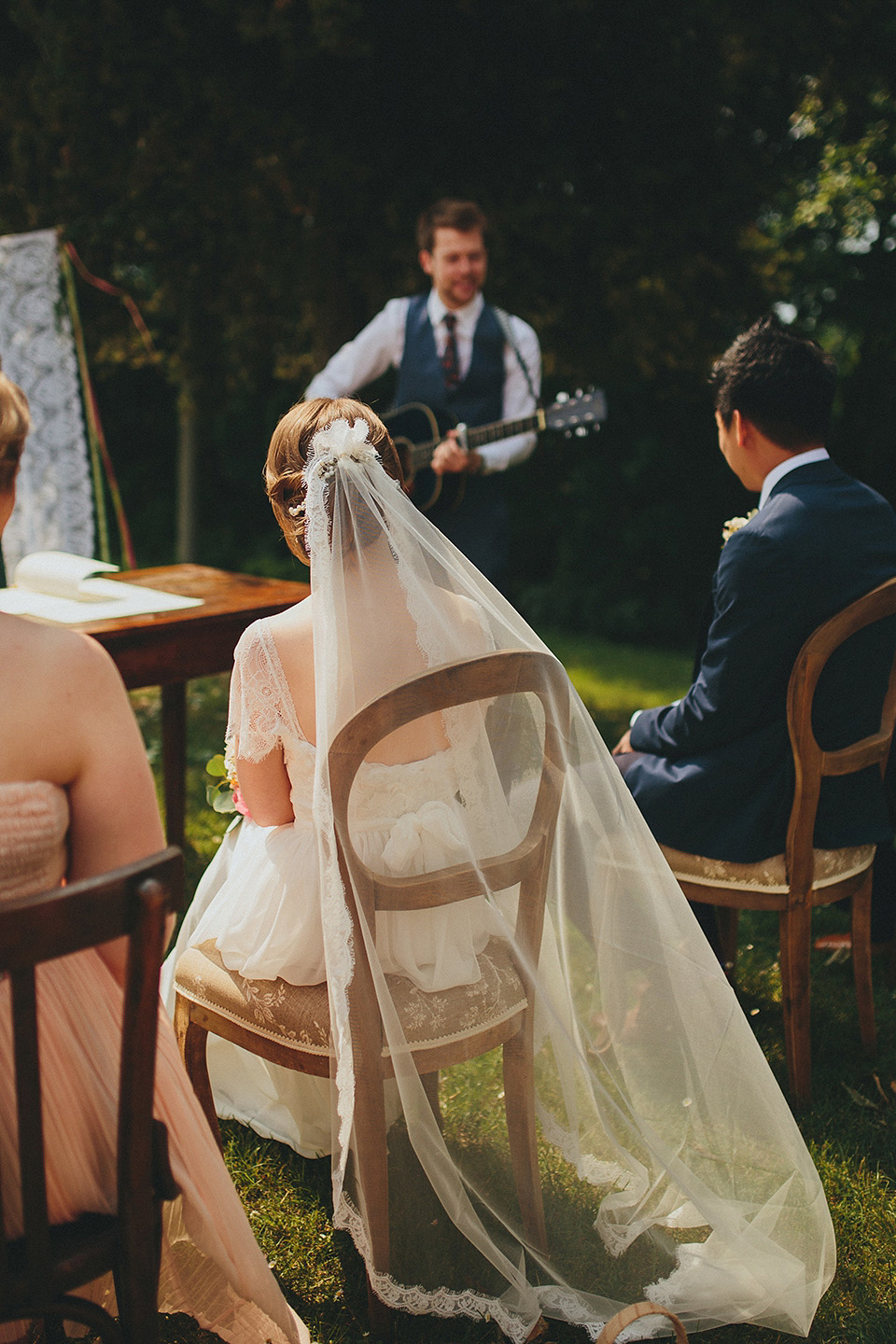 The bride wears Grace Loves Lace for her laid back, rustic, simple and elegant outdoor wedding in the Italian hillsides. Photography by Peter Jurica, film by Happy Wedding Films.