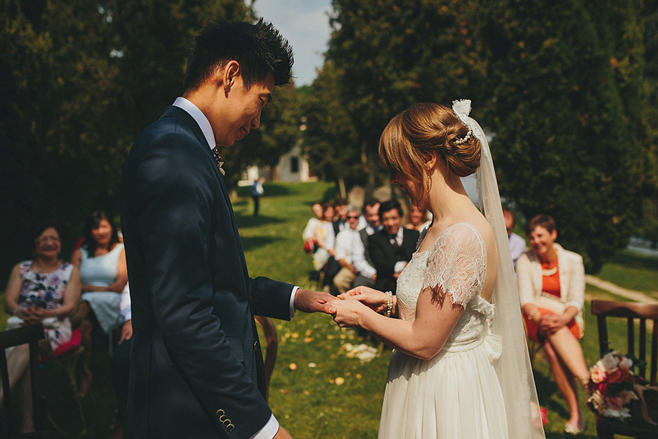 The bride wears Grace Loves Lace for her laid back, rustic, simple and elegant outdoor wedding in the Italian hillsides. Photography by Peter Jurica, film by Happy Wedding Films.