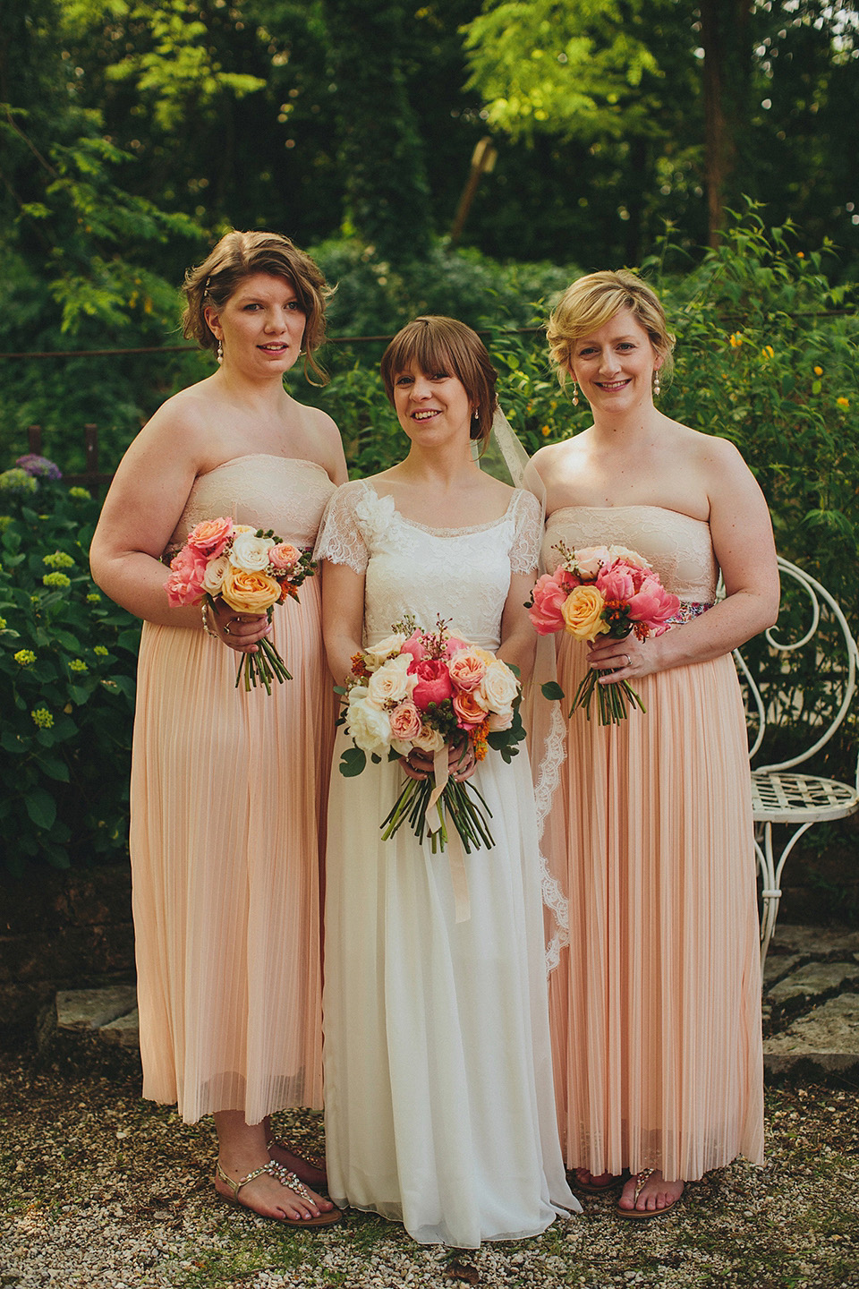 The bride wears Grace Loves Lace for her laid back, rustic, simple and elegant outdoor wedding in the Italian hillsides. Photography by Peter Jurica, film by Happy Wedding Films.