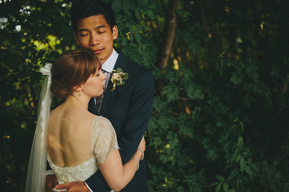 The bride wears Grace Loves Lace for her laid back, rustic, simple and elegant outdoor wedding in the Italian hillsides. Photography by Peter Jurica, film by Happy Wedding Films.