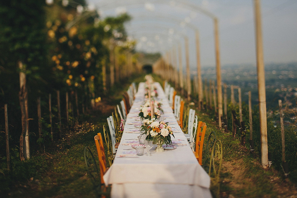 The bride wears Grace Loves Lace for her laid back, rustic, simple and elegant outdoor wedding in the Italian hillsides. Photography by Peter Jurica, film by Happy Wedding Films.