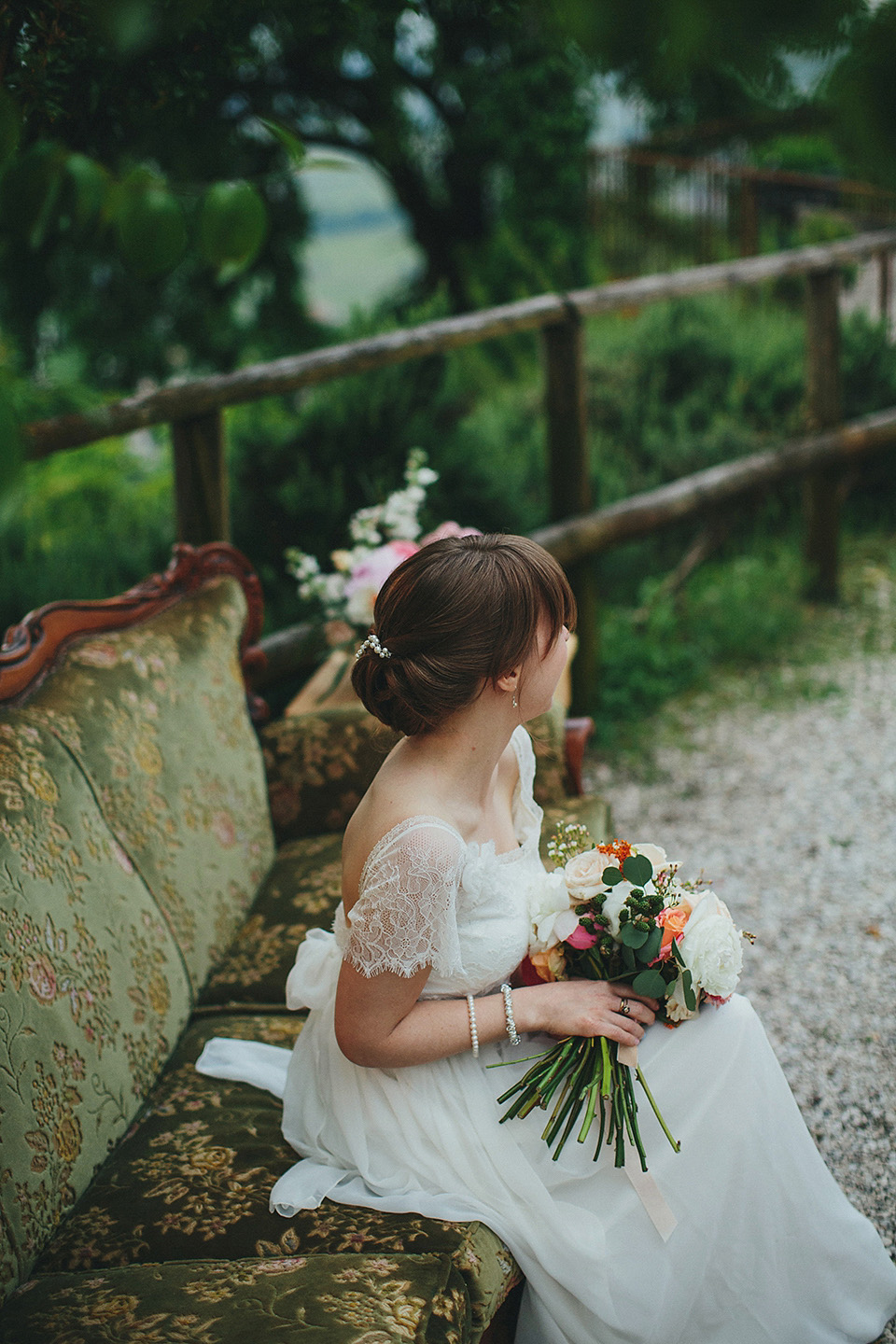 The bride wears Grace Loves Lace for her laid back, rustic, simple and elegant outdoor wedding in the Italian hillsides. Photography by Peter Jurica, film by Happy Wedding Films.