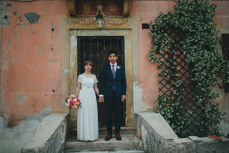 The bride wears Grace Loves Lace for her laid back, rustic, simple and elegant outdoor wedding in the Italian hillsides. Photography by Peter Jurica, film by Happy Wedding Films.