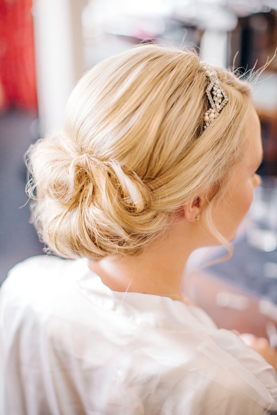 The bride wears Suzanne Neville for her Summer wedding at a vintage railway station. Images by M&J Photography.