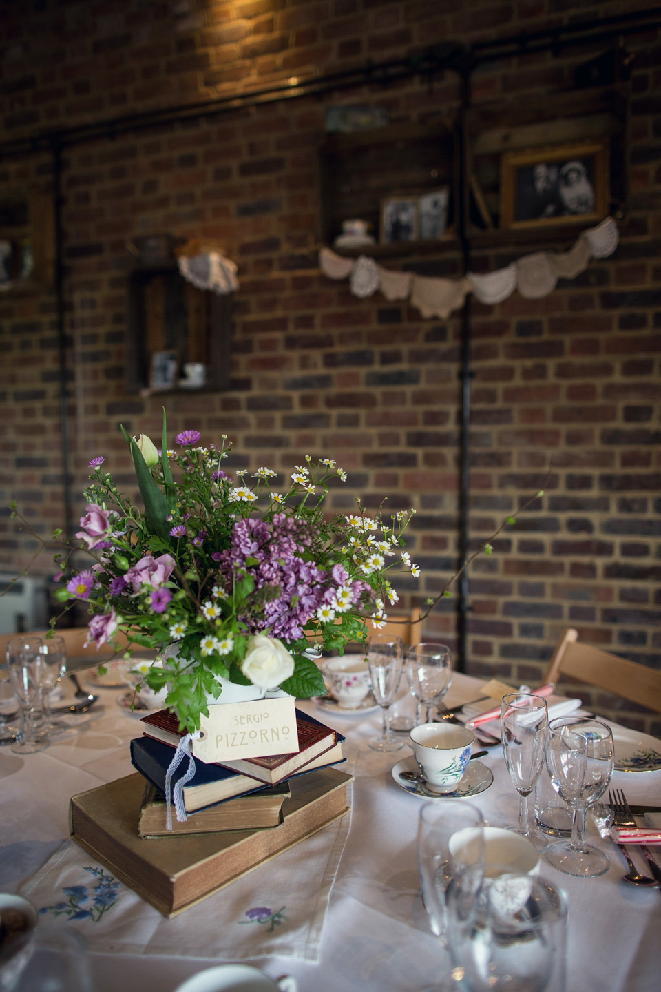 Ange and Ben's wedding was inspired by the 1940s and took place just two weeks after Ange lost her father. A beautiful celebration of love, life and family. Photography by Assassynation.