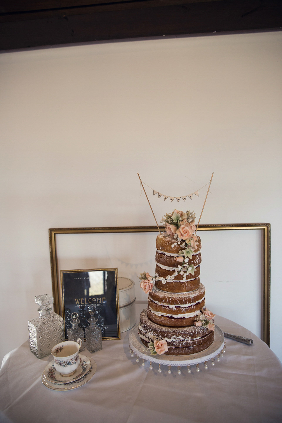 Ange and Ben's wedding was inspired by the 1940s and took place just two weeks after Ange lost her father. A beautiful celebration of love, life and family. Photography by Assassynation.