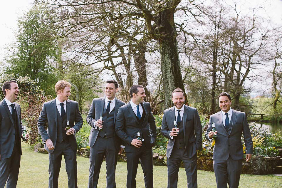 A blush pink wedding dress for a colourful and fun filled English country barn wedding. Photography by Jonny Draper.