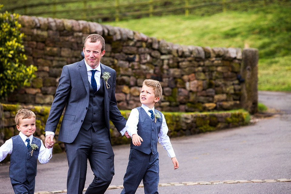 A blush pink wedding dress for a colourful and fun filled English country barn wedding. Photography by Jonny Draper.