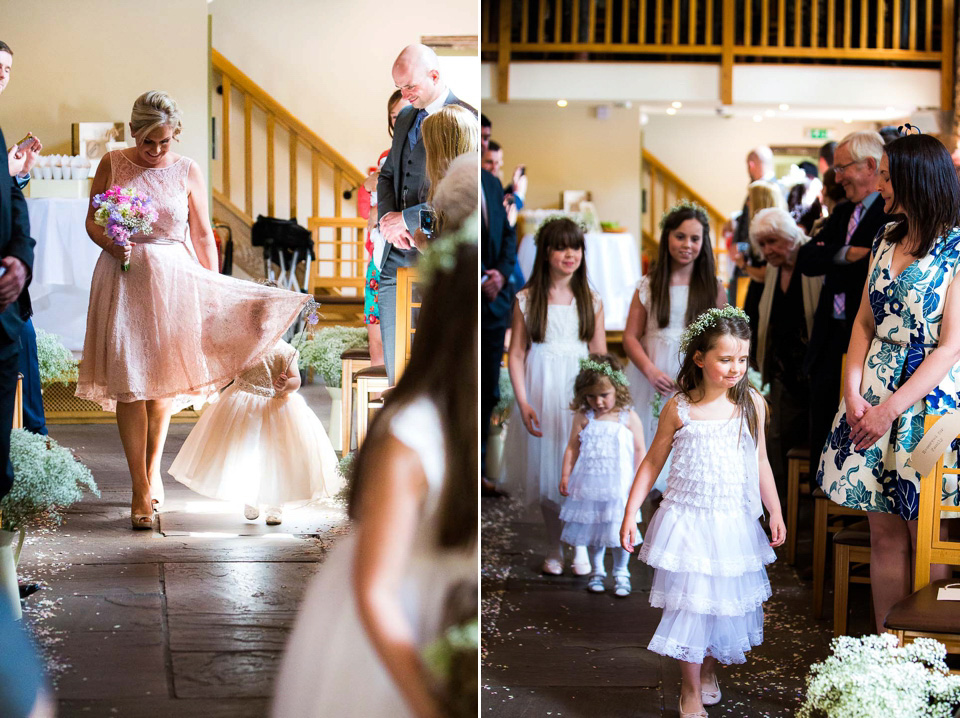 A blush pink wedding dress for a colourful and fun filled English country barn wedding. Photography by Jonny Draper.