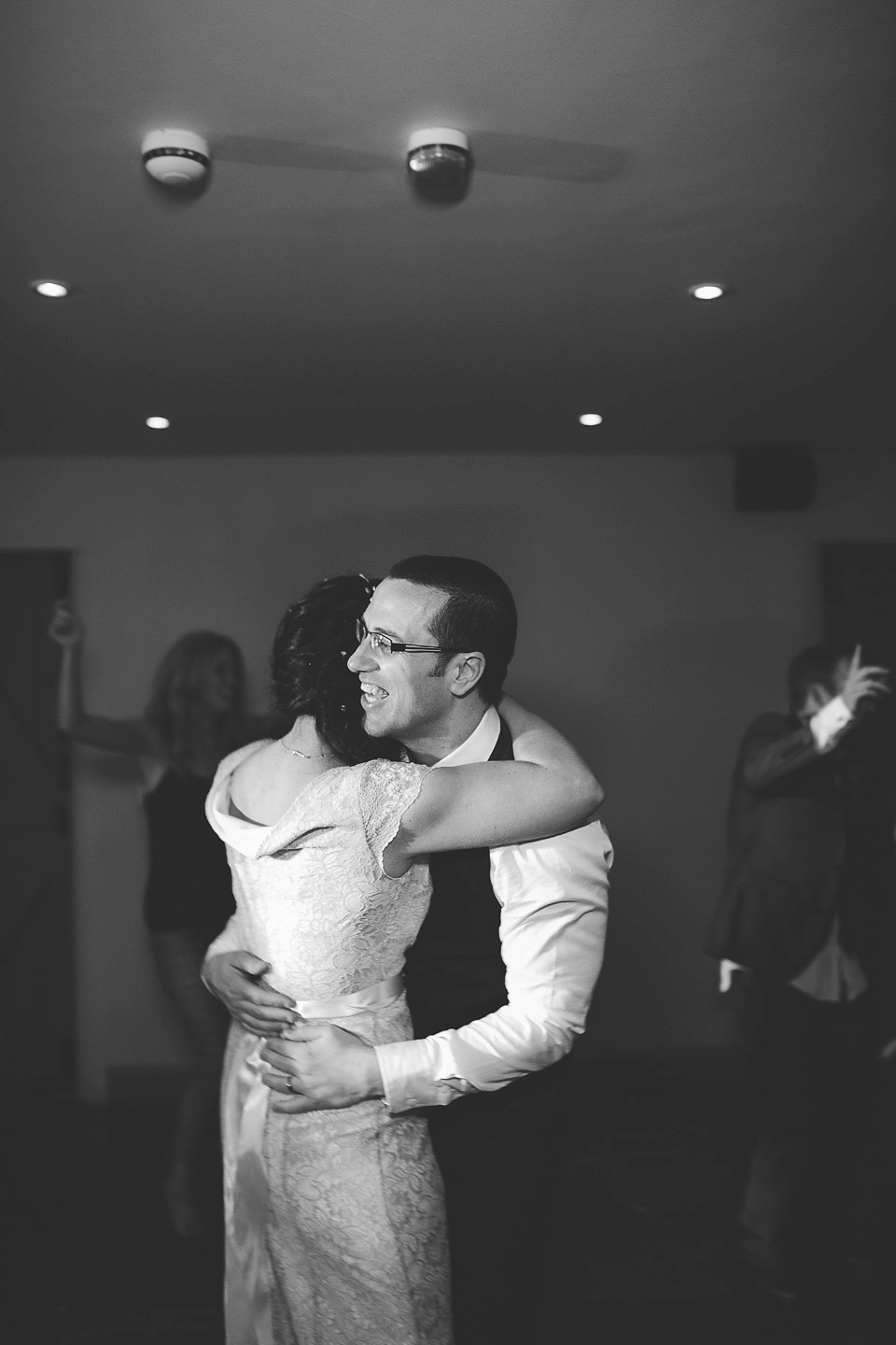 A blush pink wedding dress for a colourful and fun filled English country barn wedding. Photography by Jonny Draper.