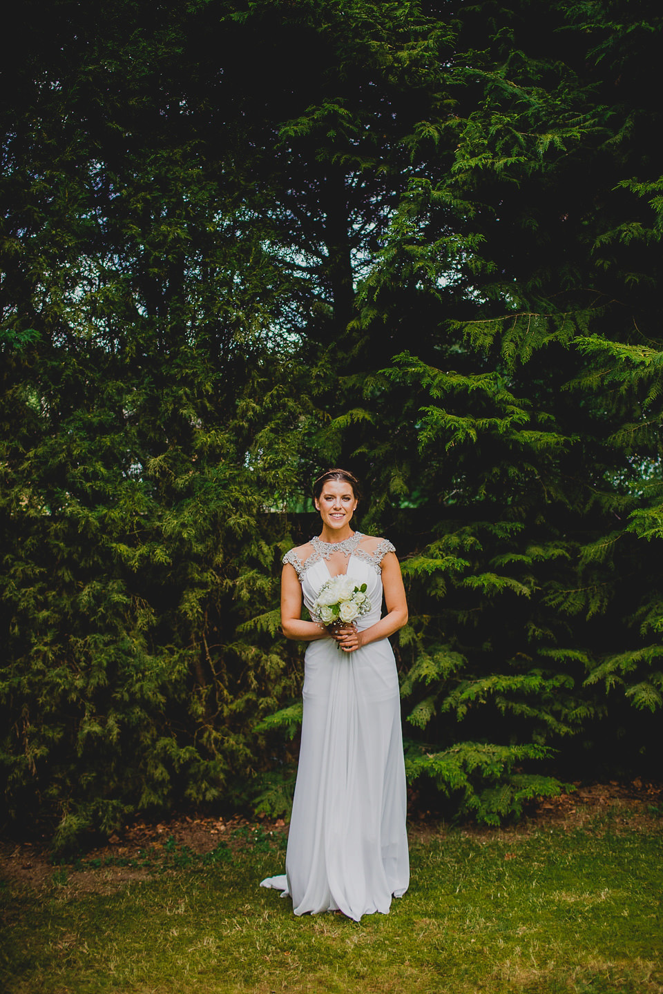 A Grecian style dress for a glamorous English country house wedding. Photography by Jonny MP.