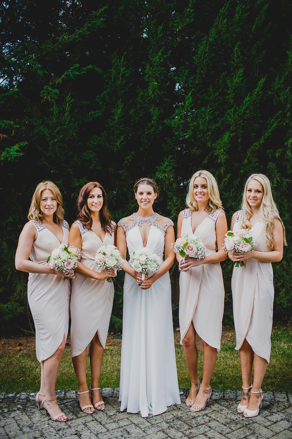 A Grecian style dress for a glamorous English country house wedding. Photography by Jonny MP.