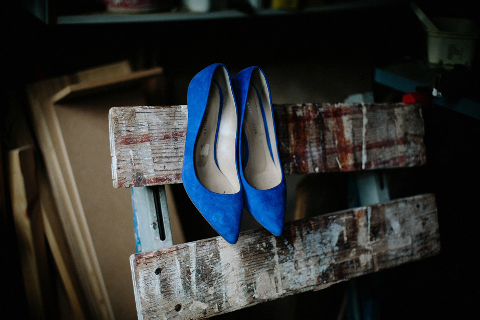 The bride wears Charlie Brear for her 'Railway Children' inspired yellow wedding. Photography by Claudia Rose Carter.