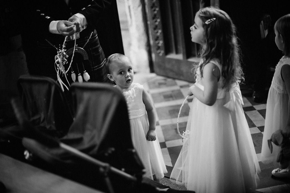 The bride wears Charlie Brear for her 'Railway Children' inspired yellow wedding. Photography by Claudia Rose Carter.