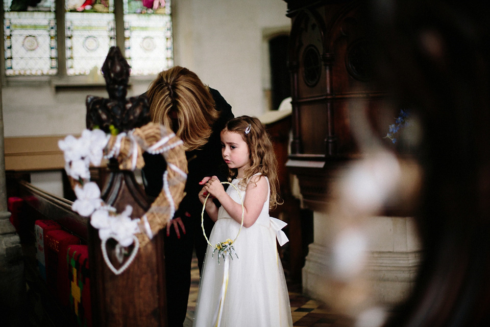 The bride wears Charlie Brear for her 'Railway Children' inspired yellow wedding. Photography by Claudia Rose Carter.