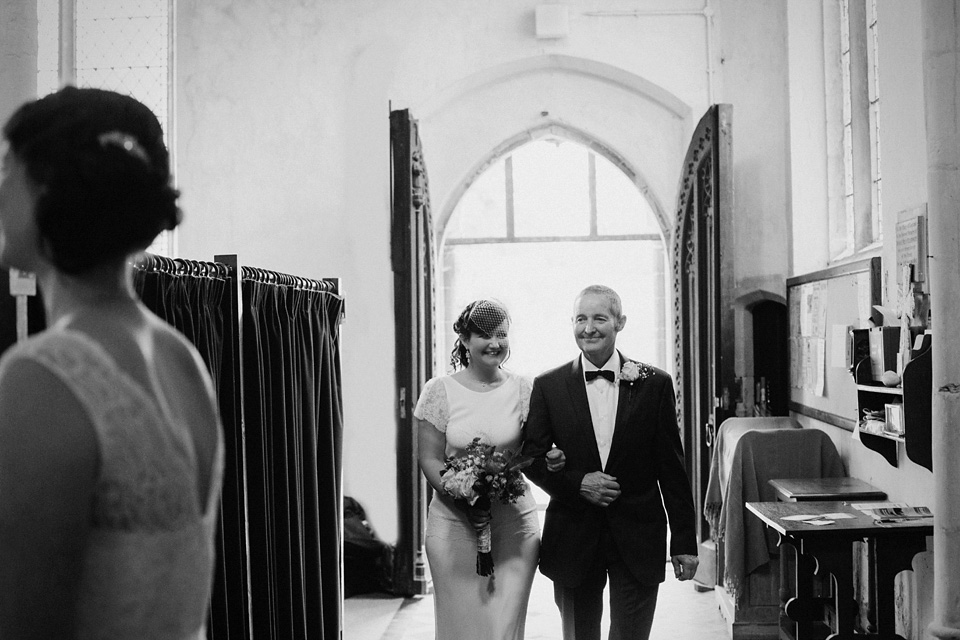 The bride wears Charlie Brear for her 'Railway Children' inspired yellow wedding. Photography by Claudia Rose Carter.