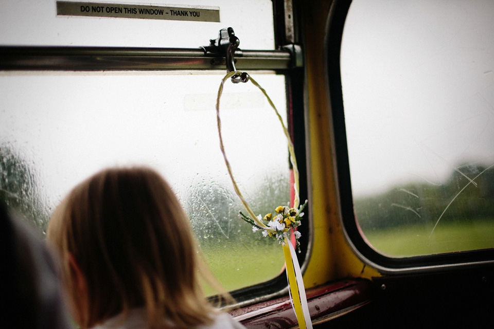 The bride wears Charlie Brear for her 'Railway Children' inspired yellow wedding. Photography by Claudia Rose Carter.