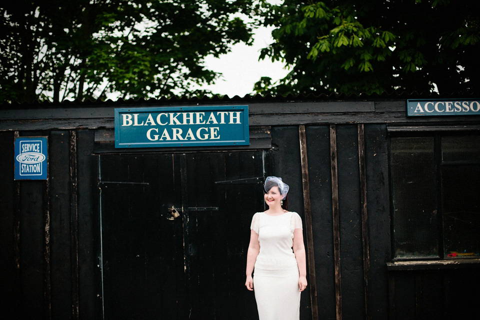 The bride wears Charlie Brear for her 'Railway Children' inspired yellow wedding. Photography by Claudia Rose Carter.