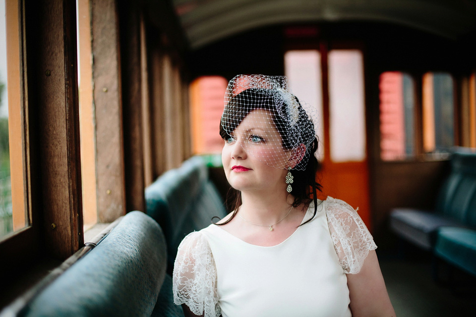 The bride wears Charlie Brear for her 'Railway Children' inspired yellow wedding. Photography by Claudia Rose Carter.