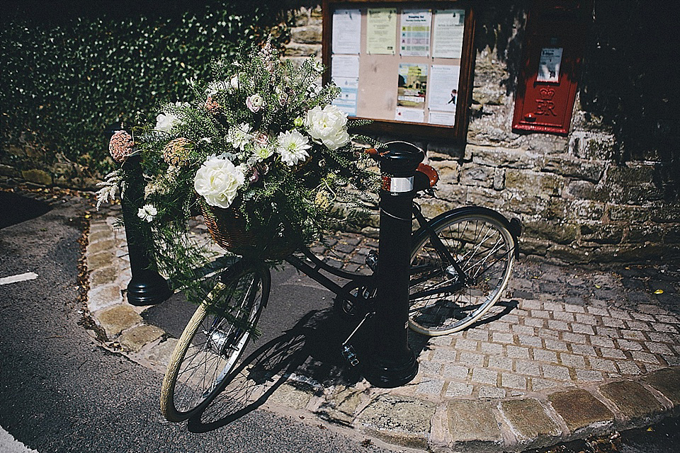 The bride wears 'Sophia' by Ian Stuart for her sweet, local, intimate and vintage inspired village wedding. Photography by The Twins.