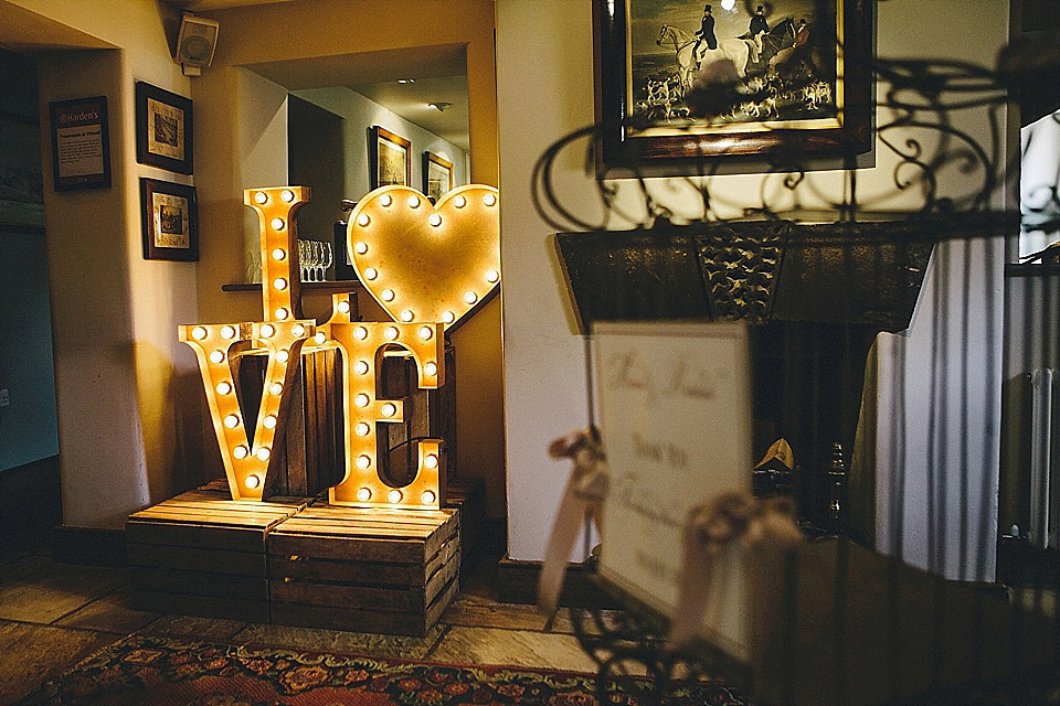 The bride wears 'Sophia' by Ian Stuart for her sweet, local, intimate and vintage inspired village wedding. Photography by The Twins.