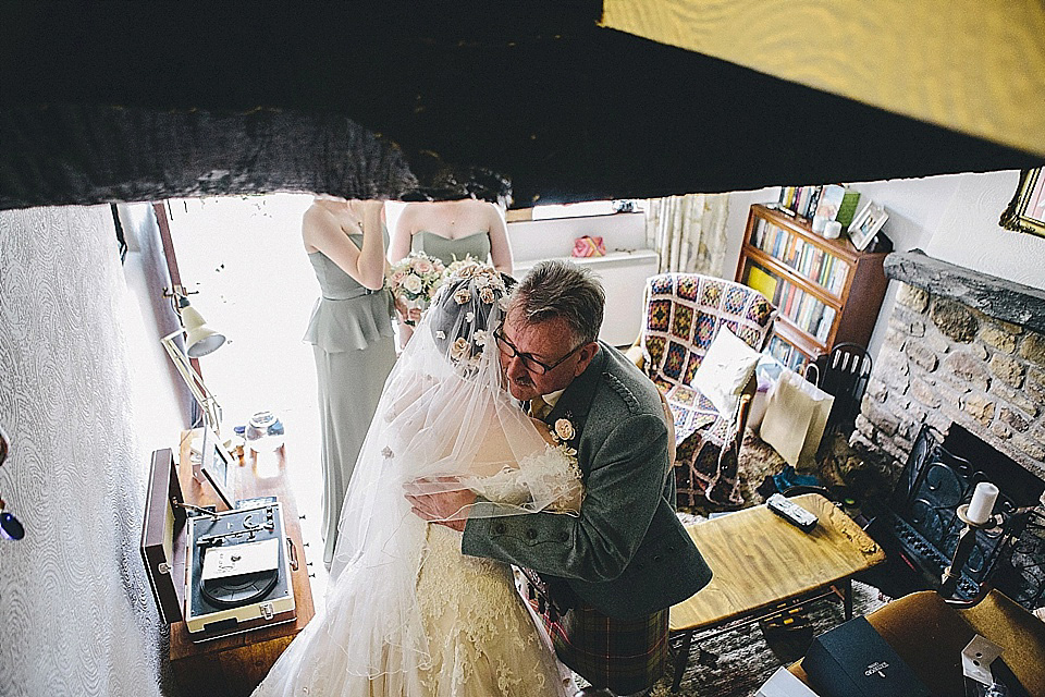 The bride wears 'Sophia' by Ian Stuart for her sweet, local, intimate and vintage inspired village wedding. Photography by The Twins.