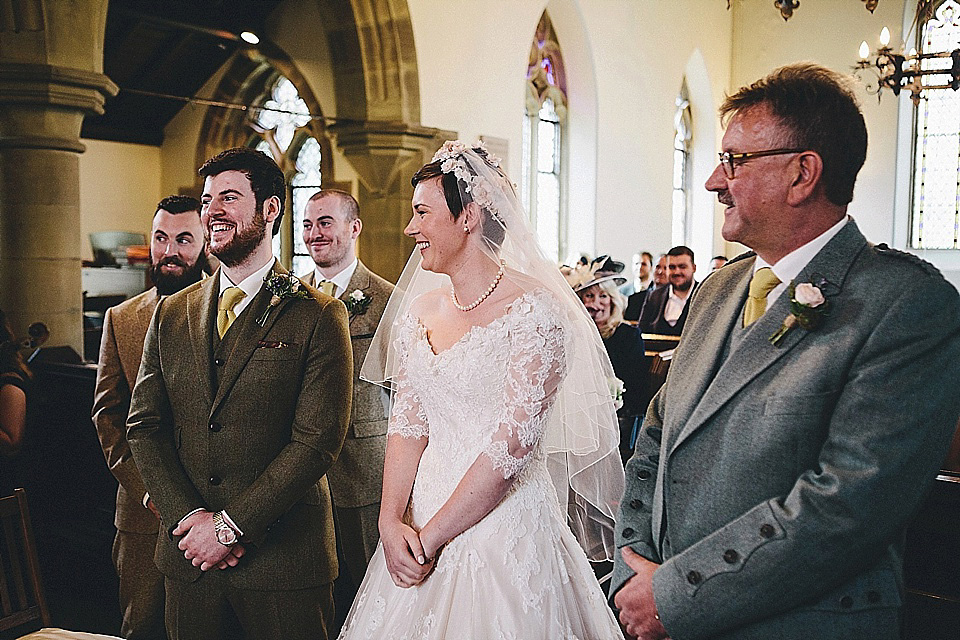 The bride wears 'Sophia' by Ian Stuart for her sweet, local, intimate and vintage inspired village wedding. Photography by The Twins.