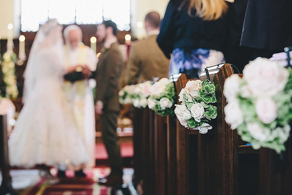 The bride wears 'Sophia' by Ian Stuart for her sweet, local, intimate and vintage inspired village wedding. Photography by The Twins.