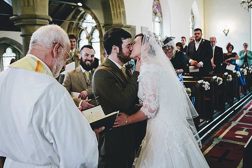 The bride wears 'Sophia' by Ian Stuart for her sweet, local, intimate and vintage inspired village wedding. Photography by The Twins.